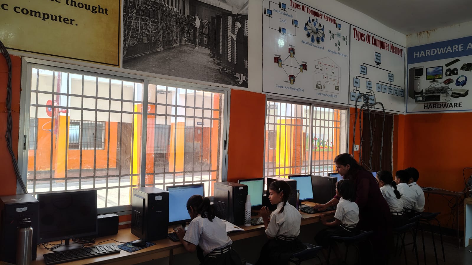 Students learning in the computer lab